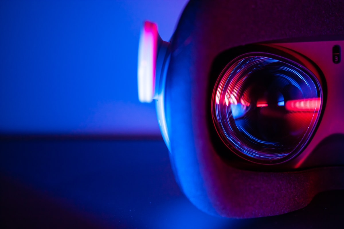 Projector lens detail in a darkened home cinema room